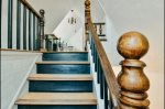 Take a Moment to Admire the Beautifully Preserved Woodwork as We Ascend